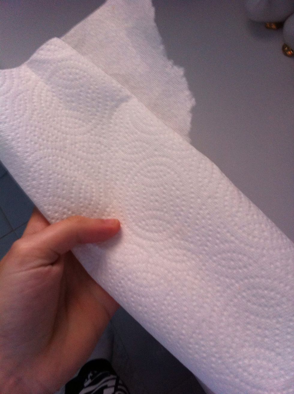 Get some dry paper towel, you will use this to dry the mirror :)