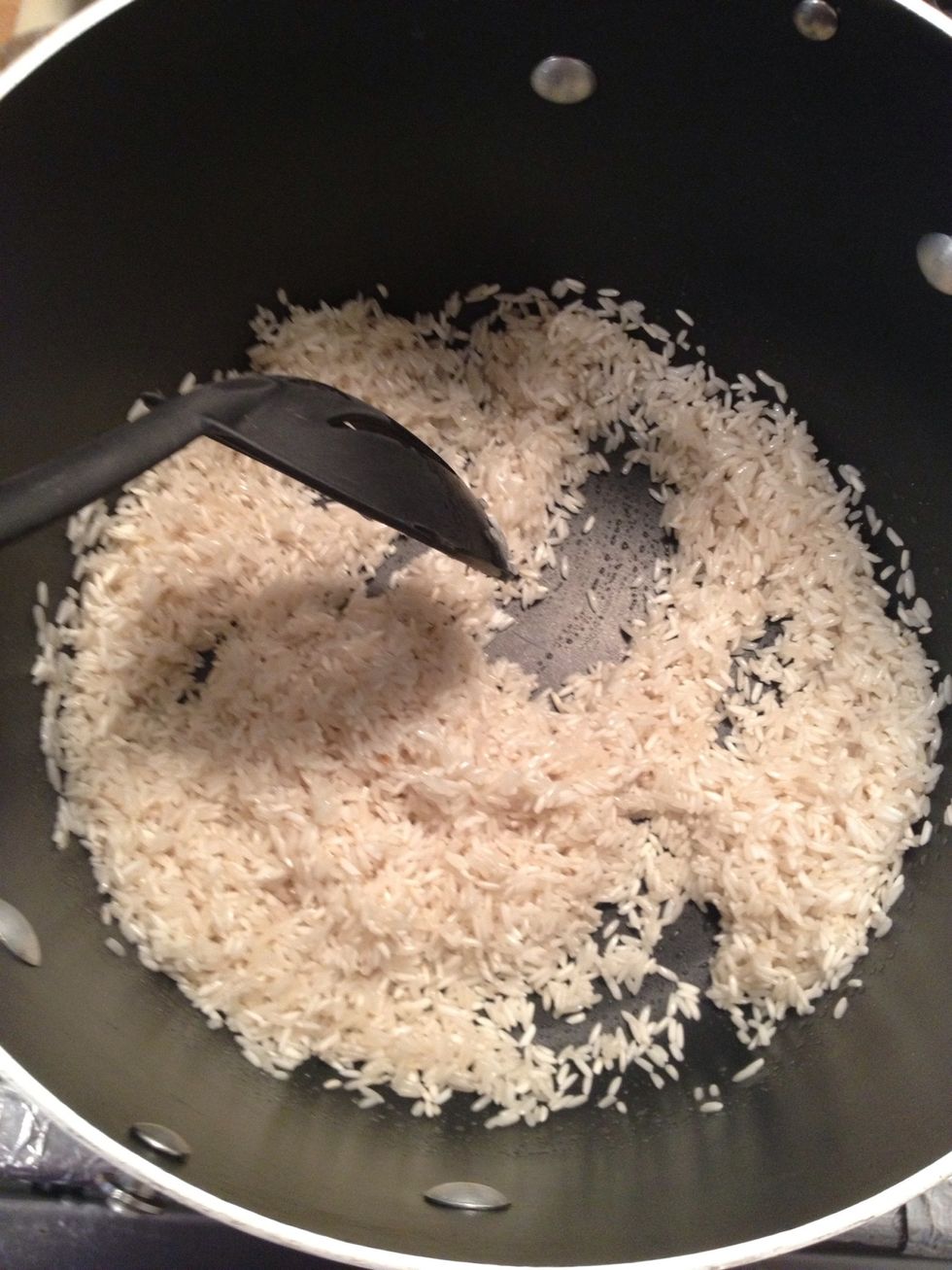 Get some hot oil in your pot approx 2-3 tablespoons and then throw in the rice to toast it! I did about 2 cups