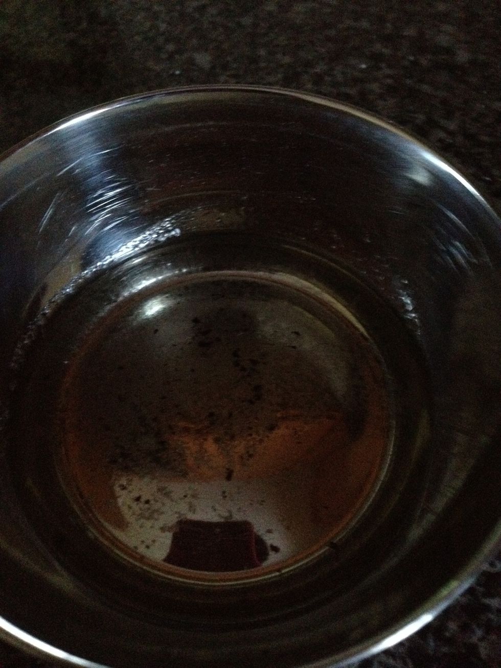 Get some oil in a bowl. I added pepper in here, but the brush I used didn't pick up the pepper so I had to add it later.