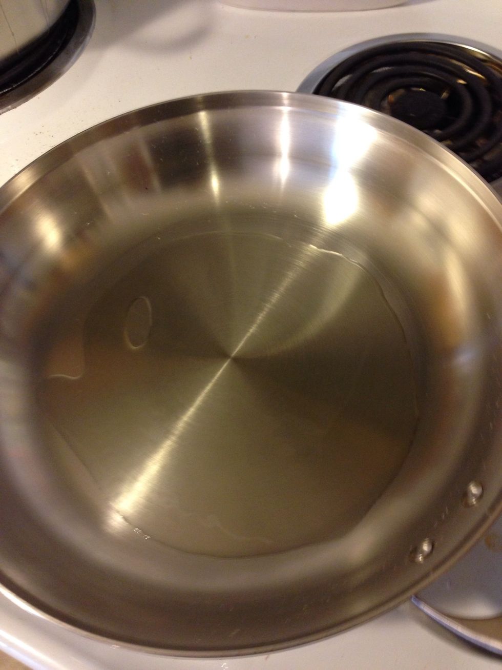 Get some olive oil in a pan and get it nice and hot! Add the onion and saut\u00e9 for about 4-5 minutes stir a bit