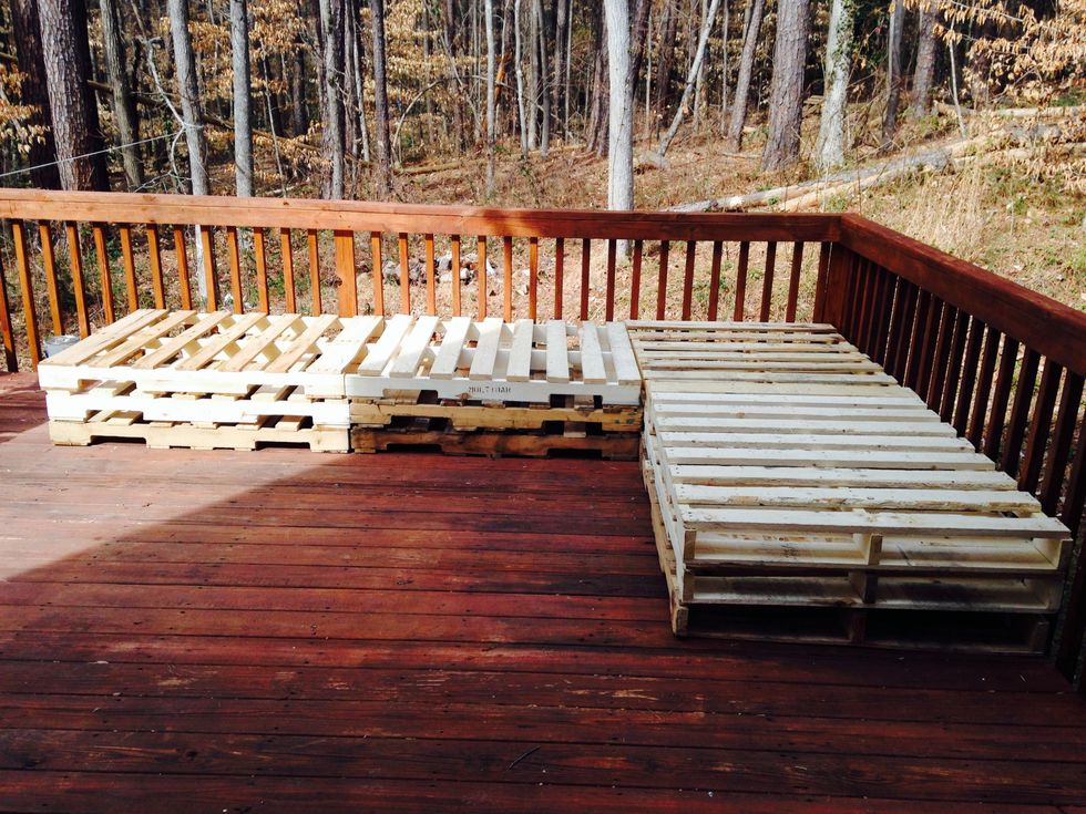 Get some pallets. Preferably the once not treated with toxins, watch out for letters MB. HT are heat treated to be mold resistant so these are ok to use. Get the amount that will fit your space