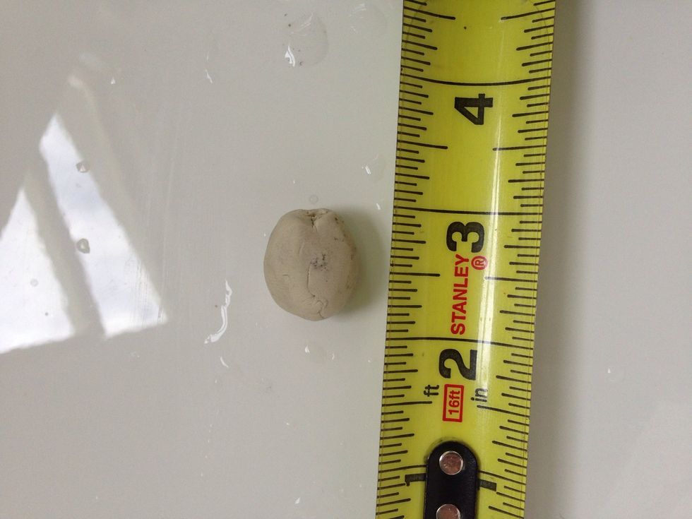 Get some plumbers putty out of the tub, you don't need much! I used a ball less than an inch in diameter.