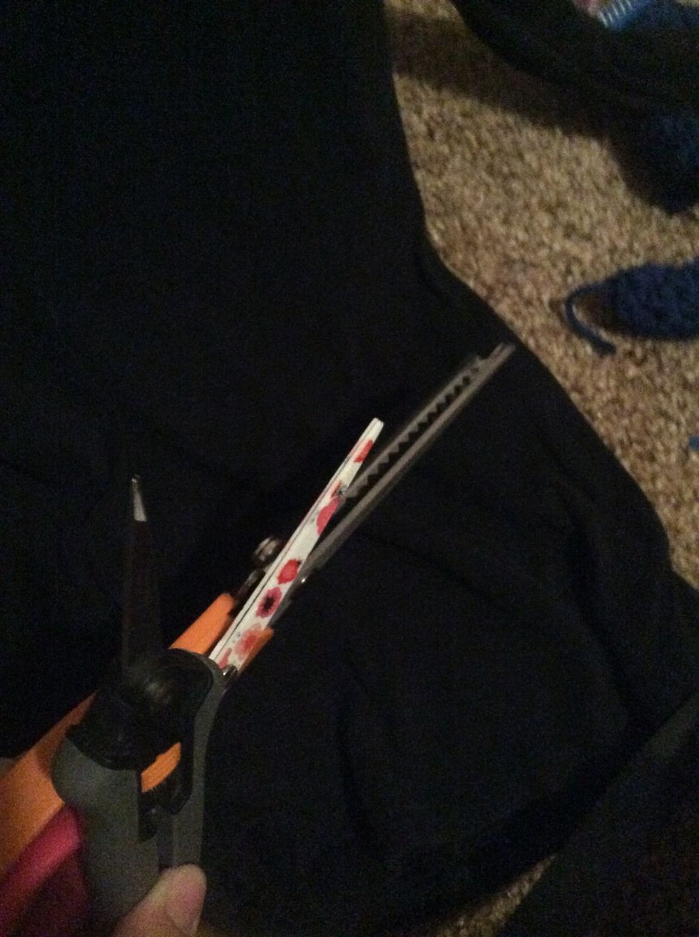Get some scissors I am using the pink ones they are regular scissors