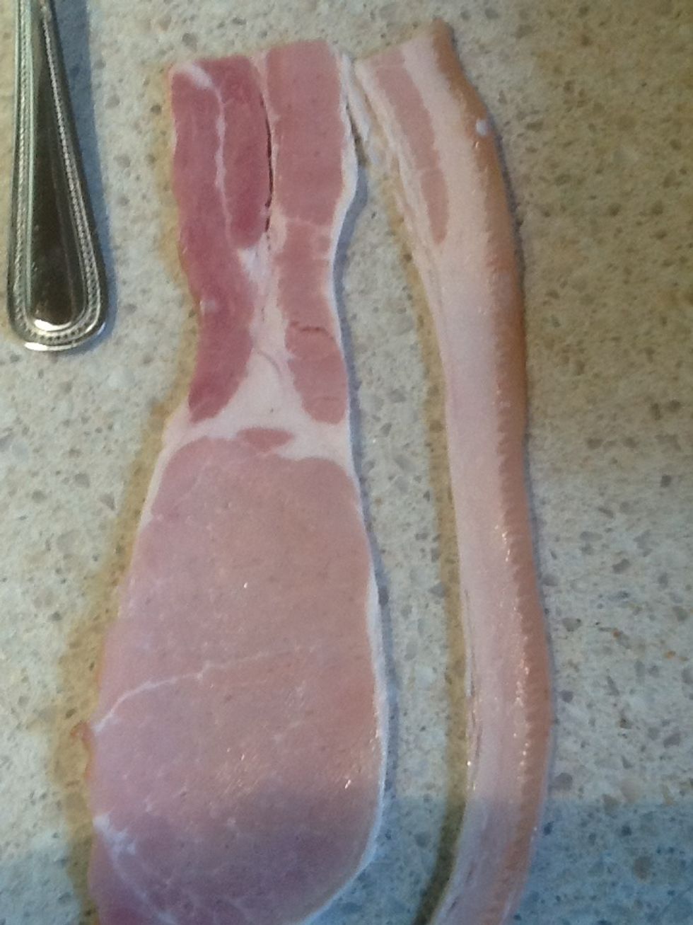 Get the bacon and remove all the fat around the sides.