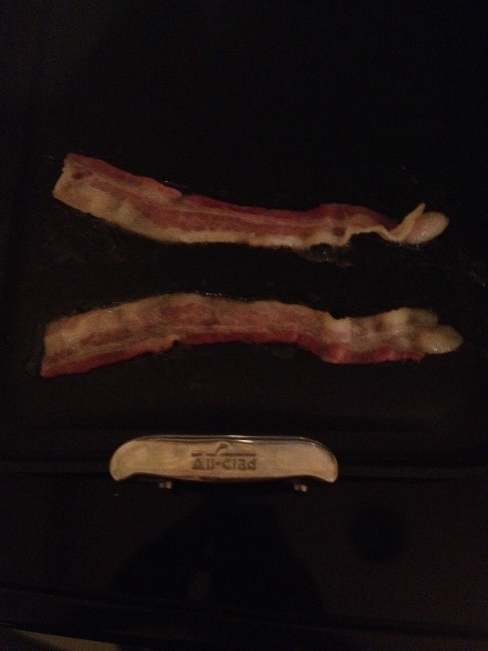 Get The bacon cooking until desired crispness. (Extra crispy for me)