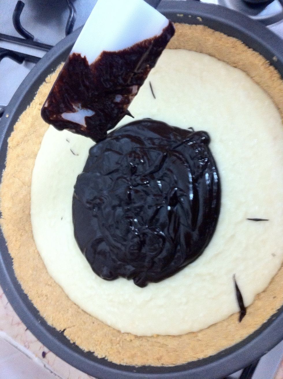 Get the base from the fridge and pour the chocolate