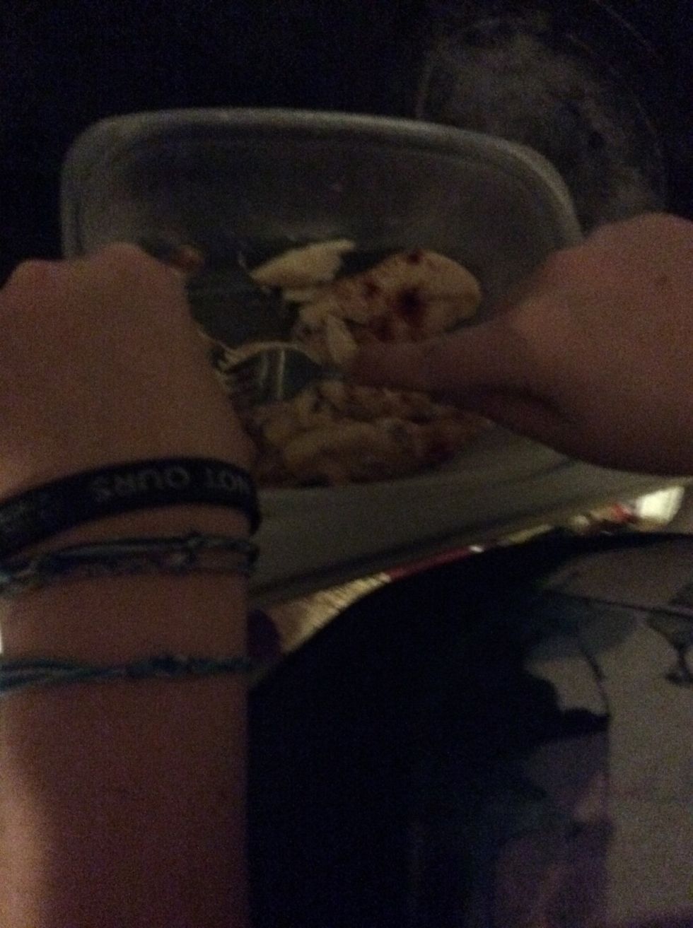 Get the chicken out of the oven at this point and pull into small pieces with a fork