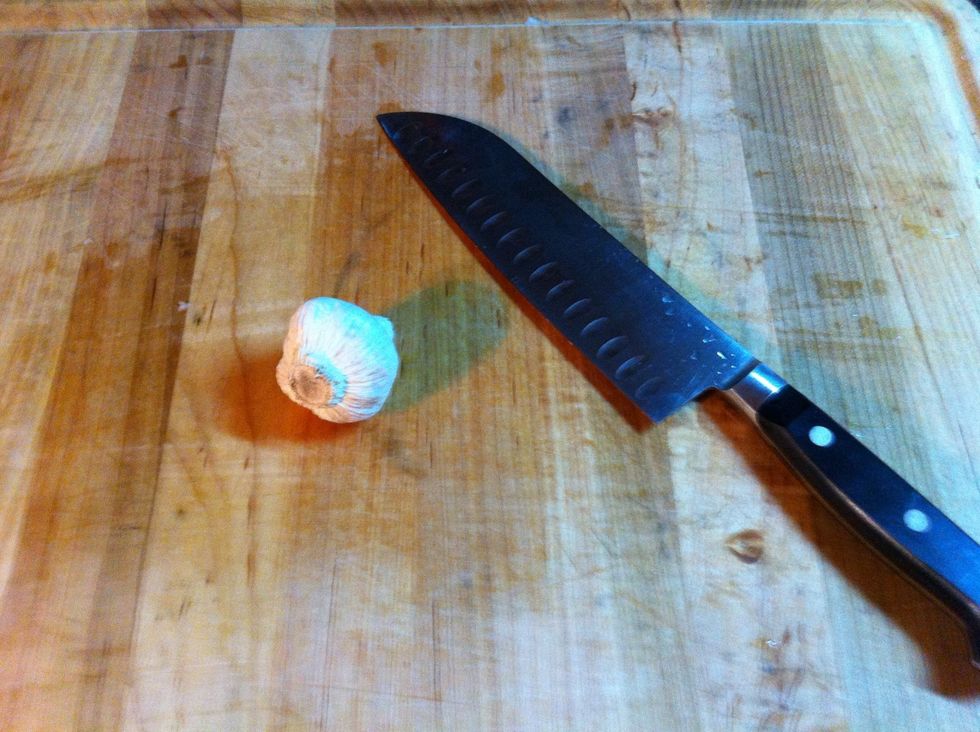 Get the cloves out of their jackets. Check out my guide on how to Chop Garlic to see how to get them out if their jackets easy.