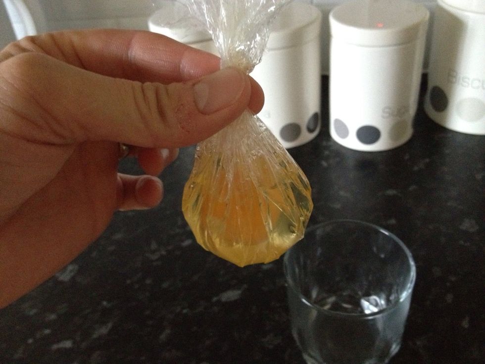Get the ends of cling film make into a little tear drop & take out the air if not it will float 2 much & not cook right then tie the tie wraps around