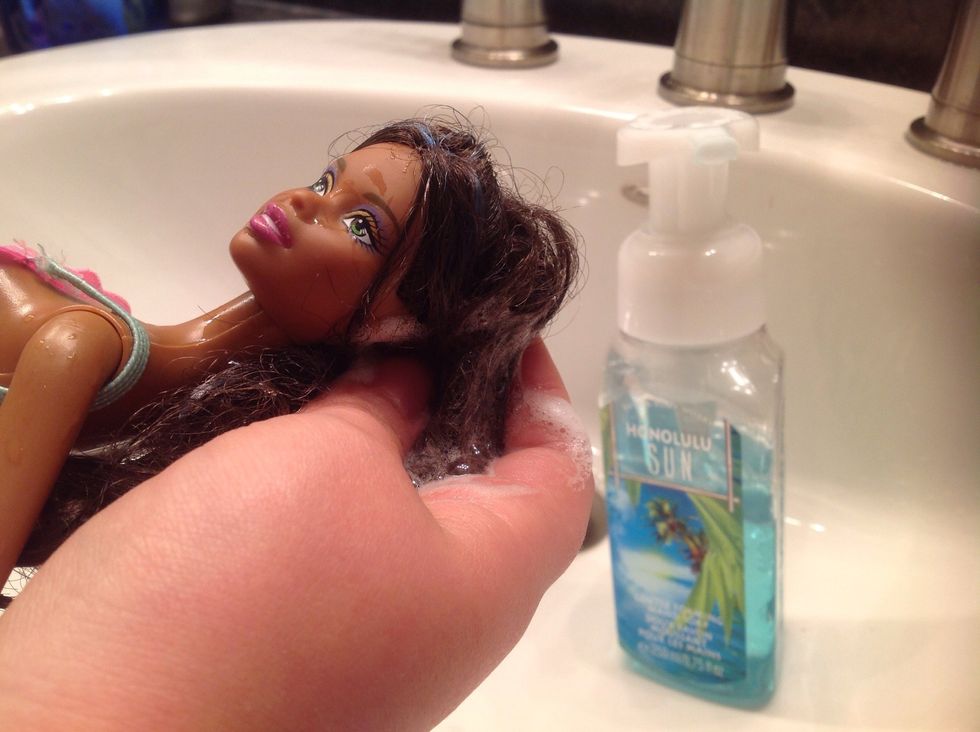 Get the foaming hand soap rub it in there hair.