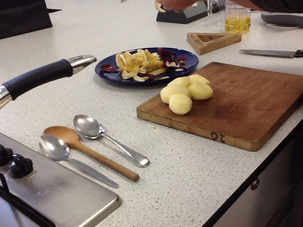 Get the potatoes ready ( good advice:put the scraps in a bowl)