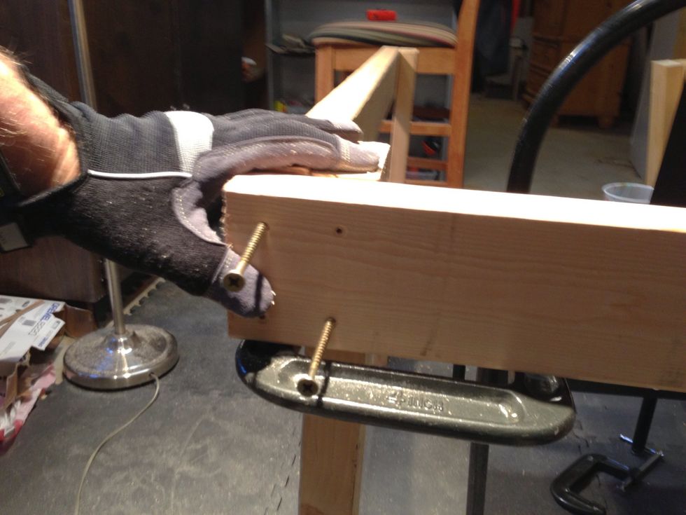 Get the wood flush and level in all directions which is easier said than done with one hand while taking a picture or using screw driver.