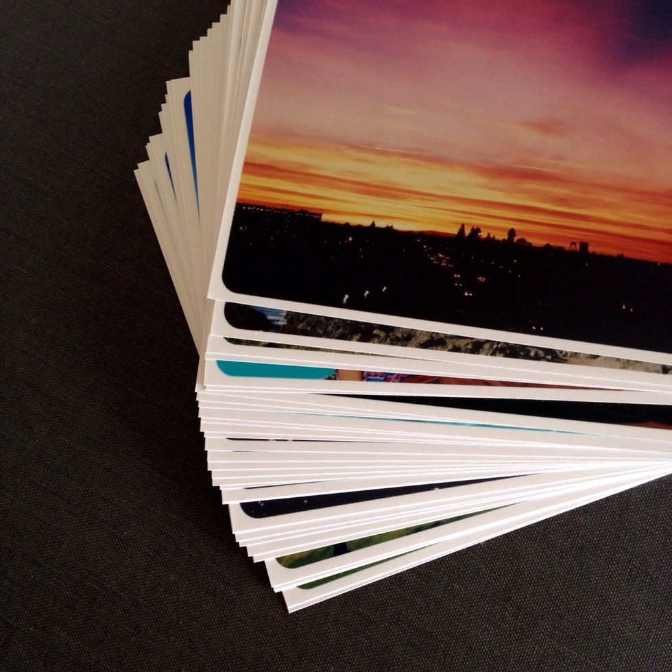 Get those Android or iPhone photo prints ordered! For this set, there were 32 4x4s used and a white border was applied via Camera+.