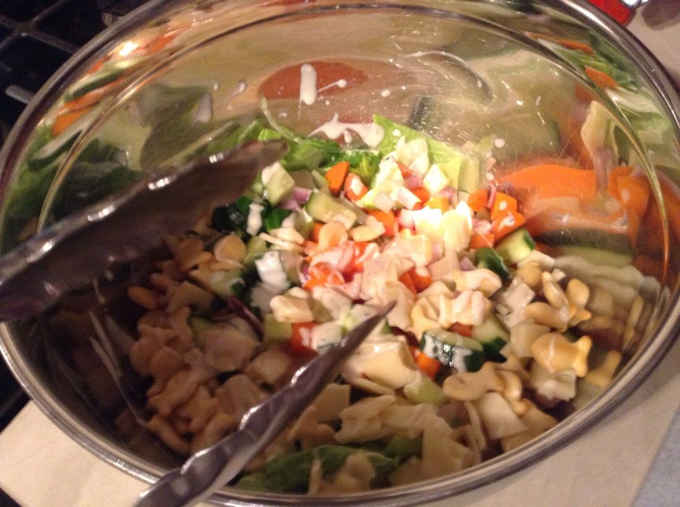 Get tongs or salad mixers to mix!