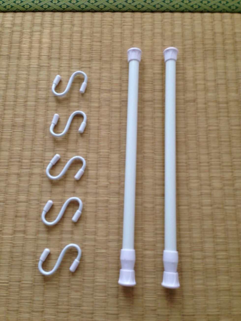 Get two(2) extension rods and five(5)  "S" hooks. I got them at the 100 Yen shop. I hope you can get similar ones in your country, too.