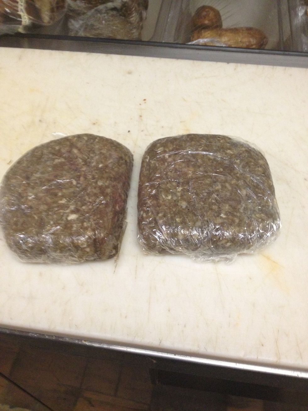 Get two burgers and flatten them