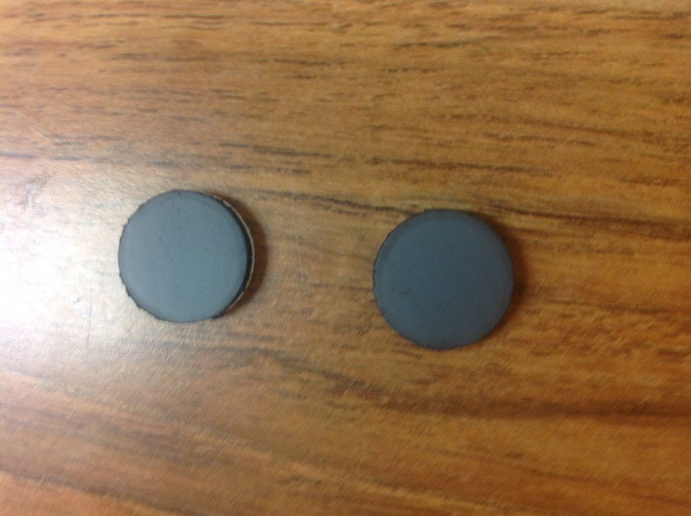 Get two magnets and peel off sticky back