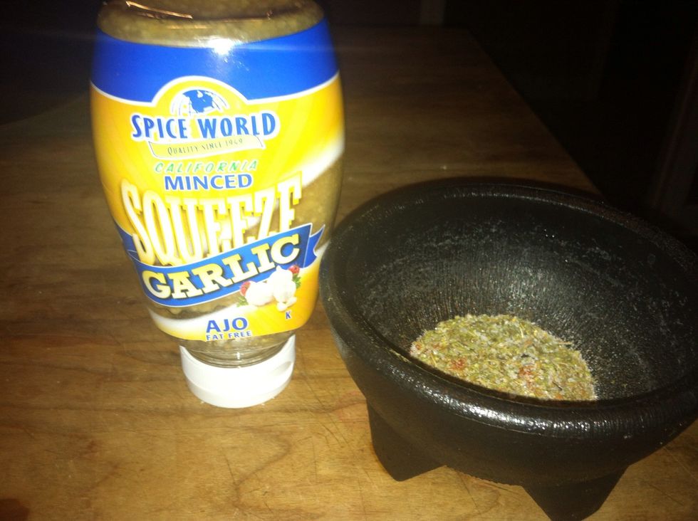 Get two plates ready, one for the garlic the other for the spice mixture.