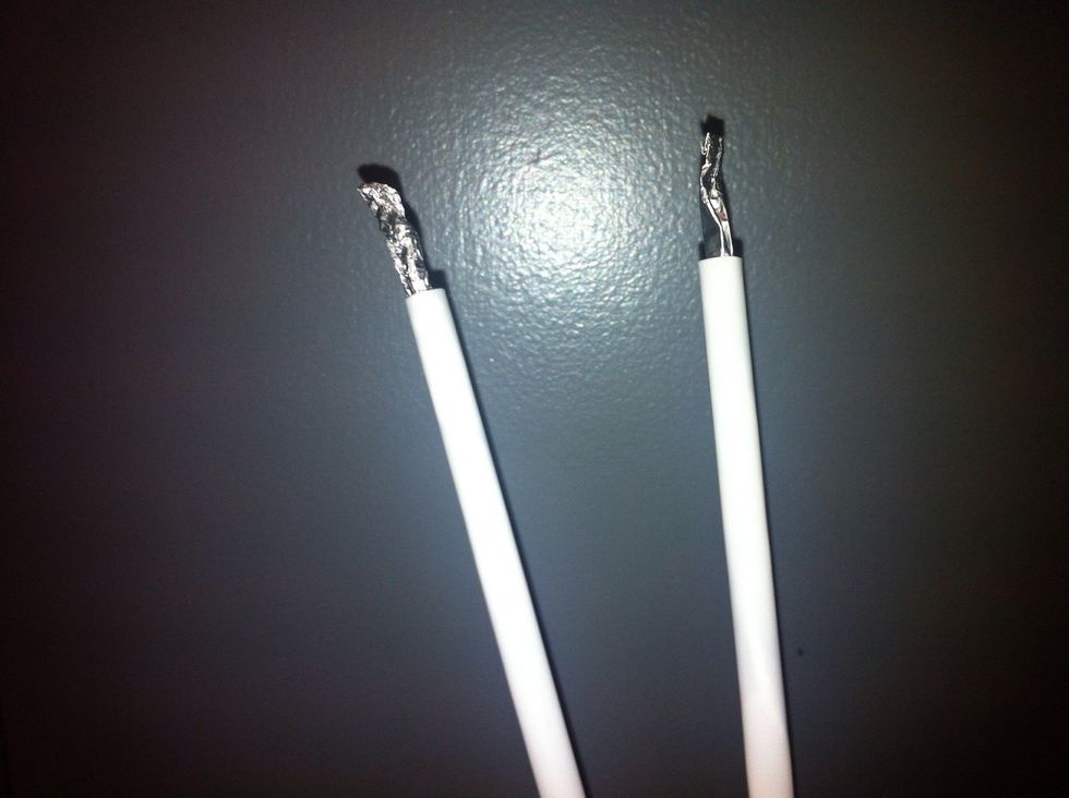 Get two straws and some aluminum foil. Roll up some foil and insert the foil through the straws so the foil sticks out of both ends of the straw at least as much as you see in this image.