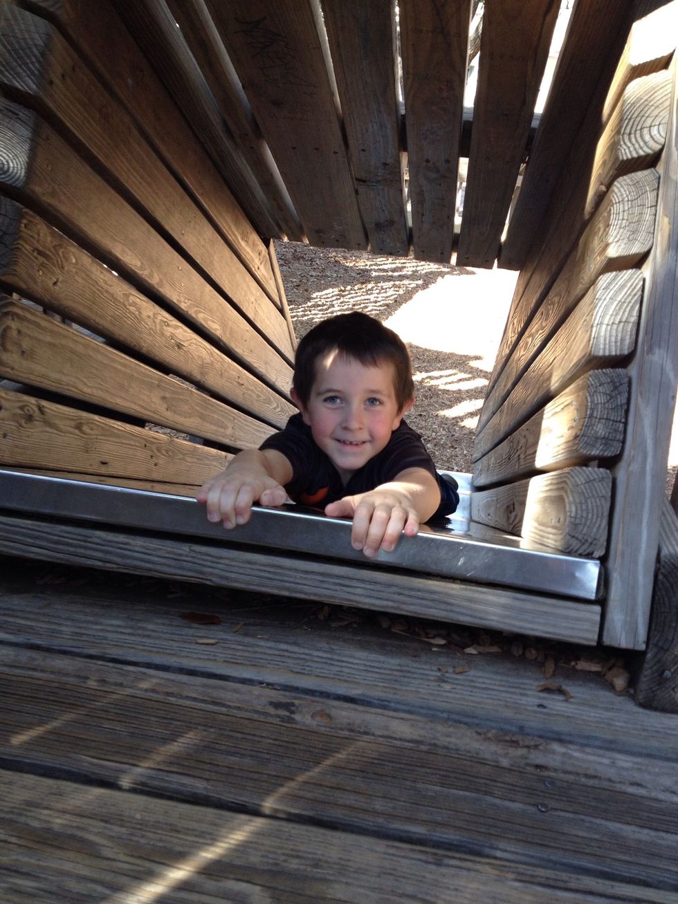 Get up!  And shoot down...  Elevation is always great for portraits, as it's a flattering angle for everyone.