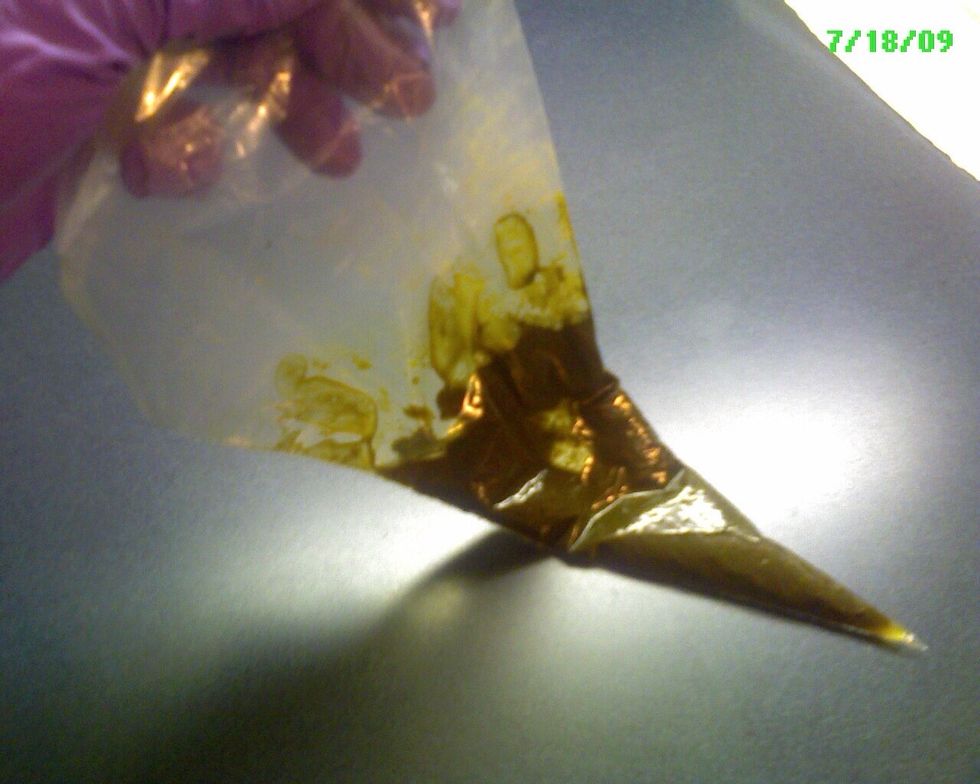 Get used to the right consistency by seeing if it holds together. Wet, but not drippy, is ideal. The mud needs to hold a "bead" when you draw a line, but not so firm that it is difficult to squeeze.