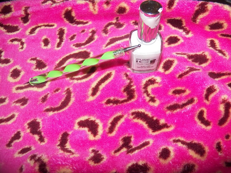 Get white polish and a large dotting tool.