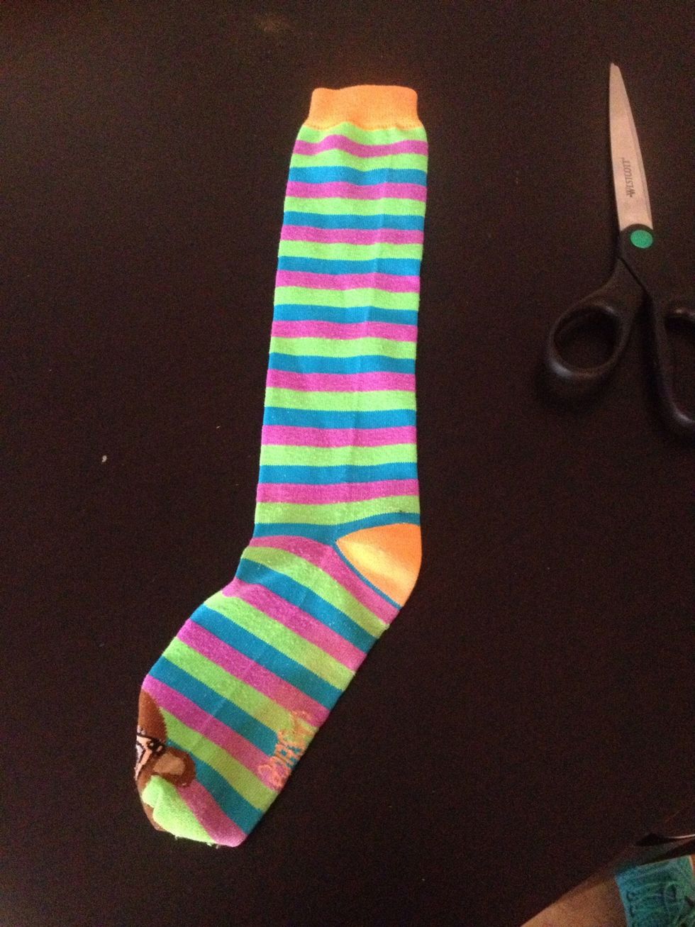 Get you a sock, we are using a child's sock because its for a child's arm