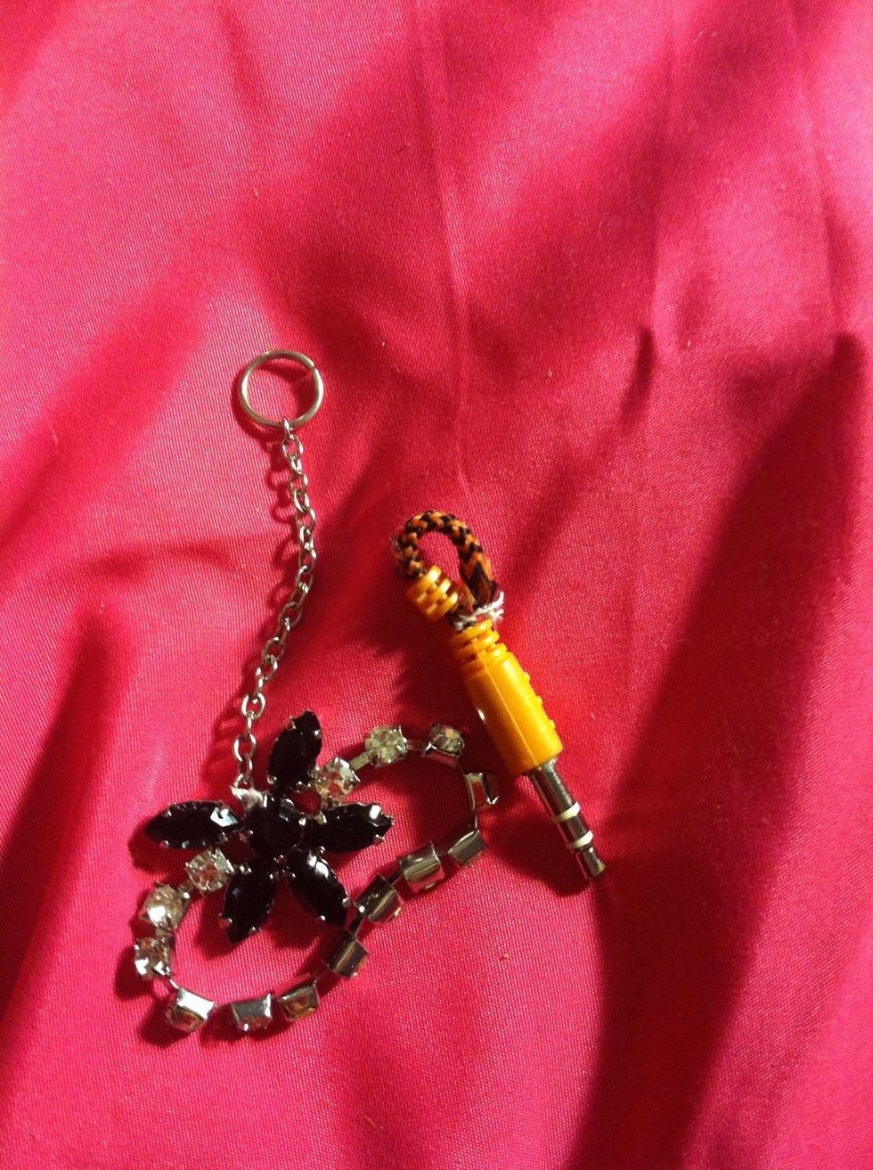 Get you're keychain if you didn't place it on before. Open the little hook with pliers, hands (if you're strong) in this case sizers are all I have