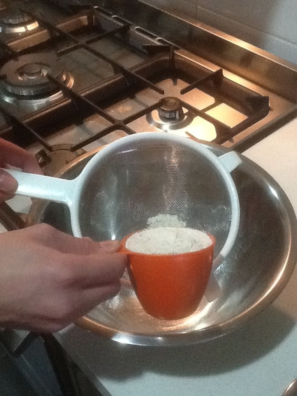 Get your 1 Cup of wholemeal self raising flour and sift it into the bowl.