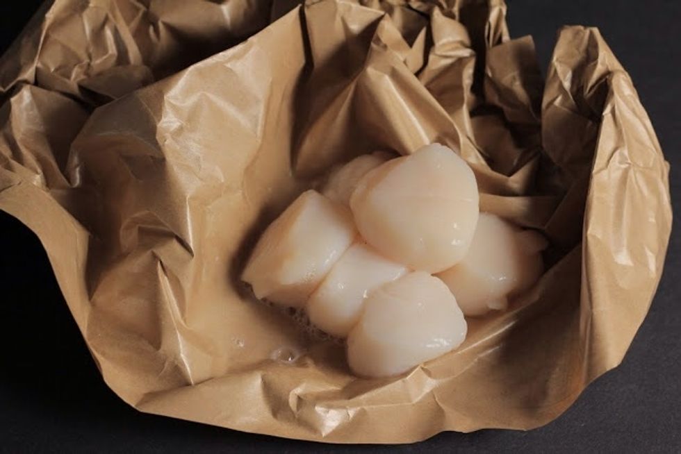 Get your 12 large scallops together. There will be 3 large scallops per person.
