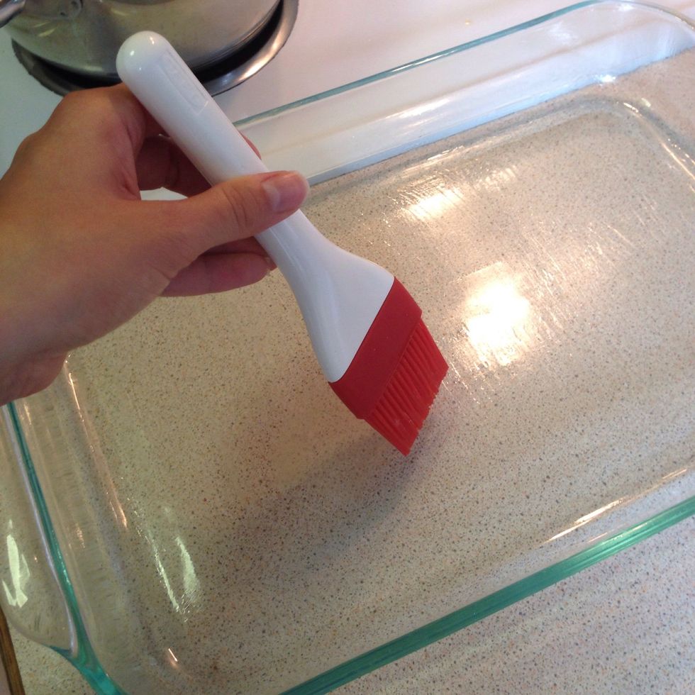 Get your baking tray and brush some of the melted butter along the bottom and sides.