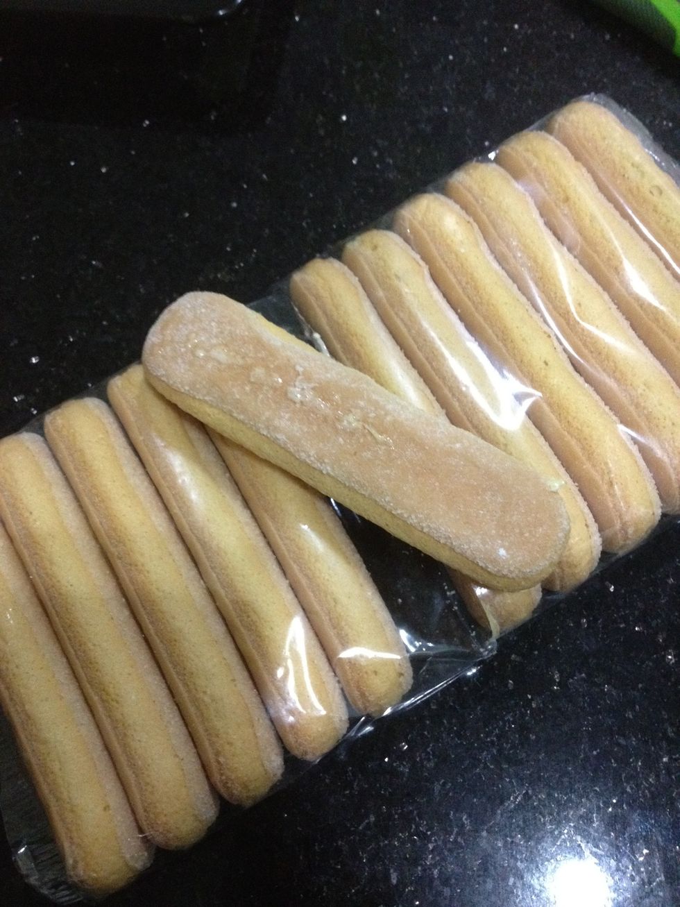 Get your biscuits. These are actually sponge fingers. But when you're buying them, trying looking for the Italian ones which, are called savoiardi.