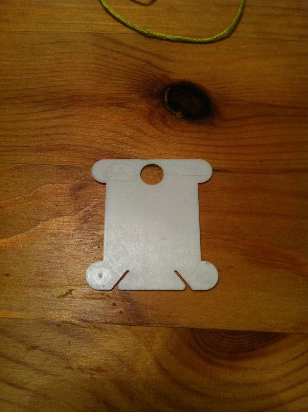 Get your bobbin ready. I'll show you how to make one a few steps down the line. These can be purchased at craft stores in different sized packs. This is DMC brand but I'm sure others make them too.