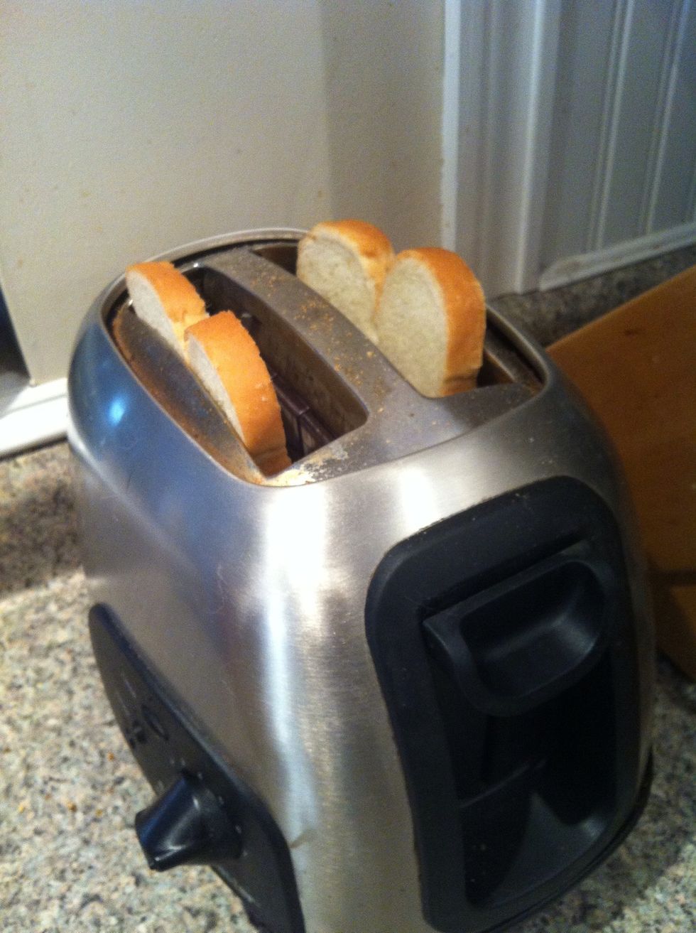 Get your bread or bagel or English muffin and put it in the toaster, but don't push it down yet