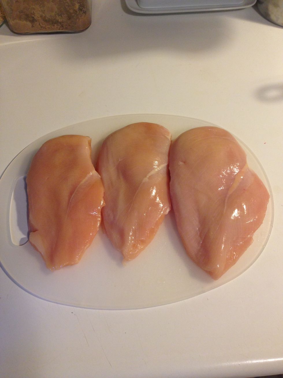 Get your breasts ready. I like to take mine out of the fridge for about 10-15 minutes to bring them closer to room temp. Then I pat them dry with a paper towel. This will help hold the rub later