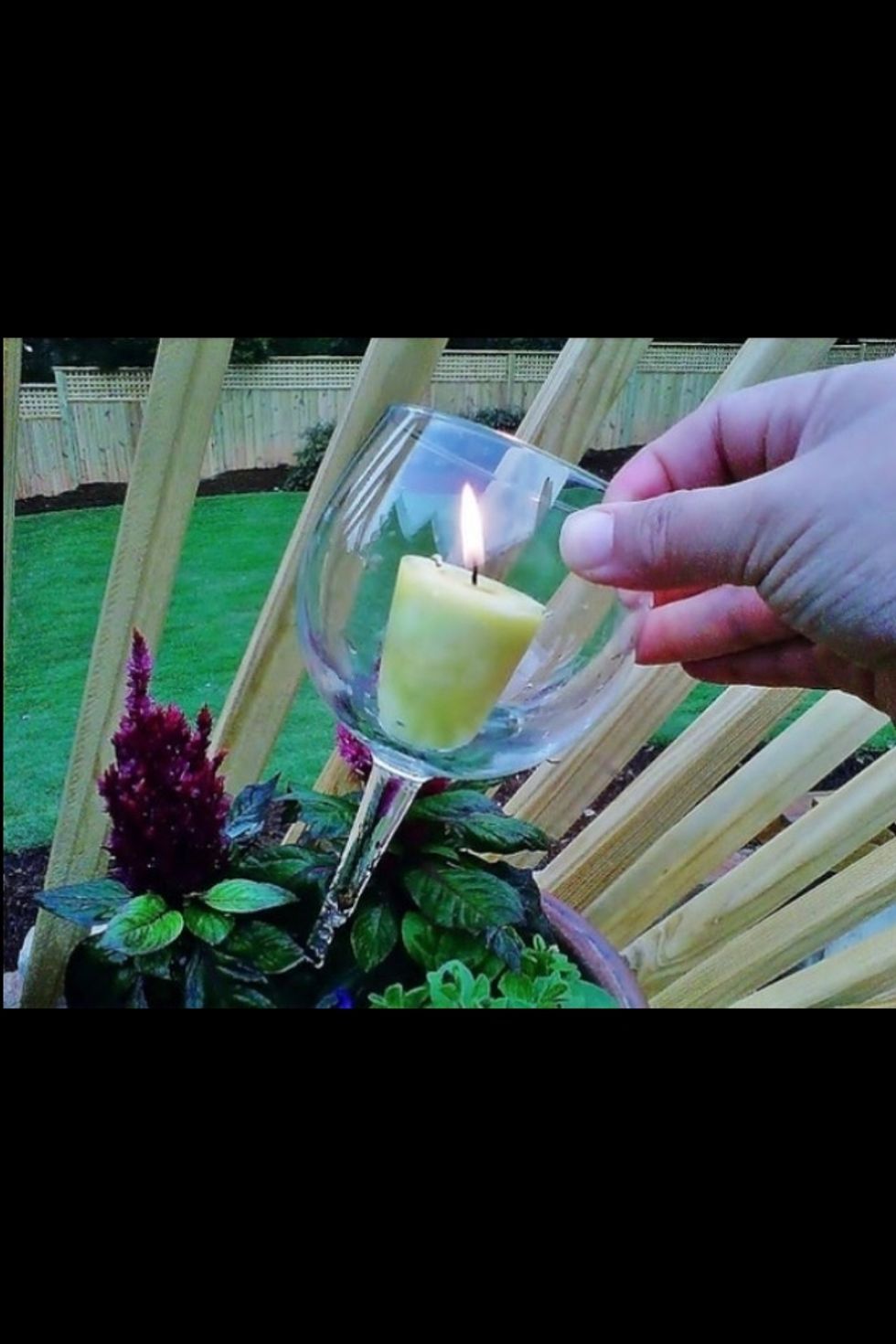 Get your broken glass pop a candle in it and then put it into your potted plans looks fab at night