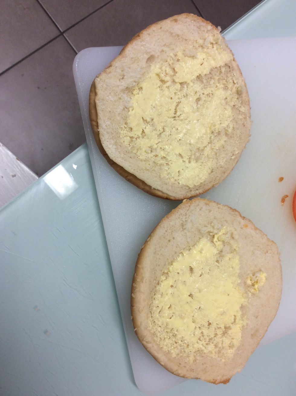 Get your buns and add butter to them