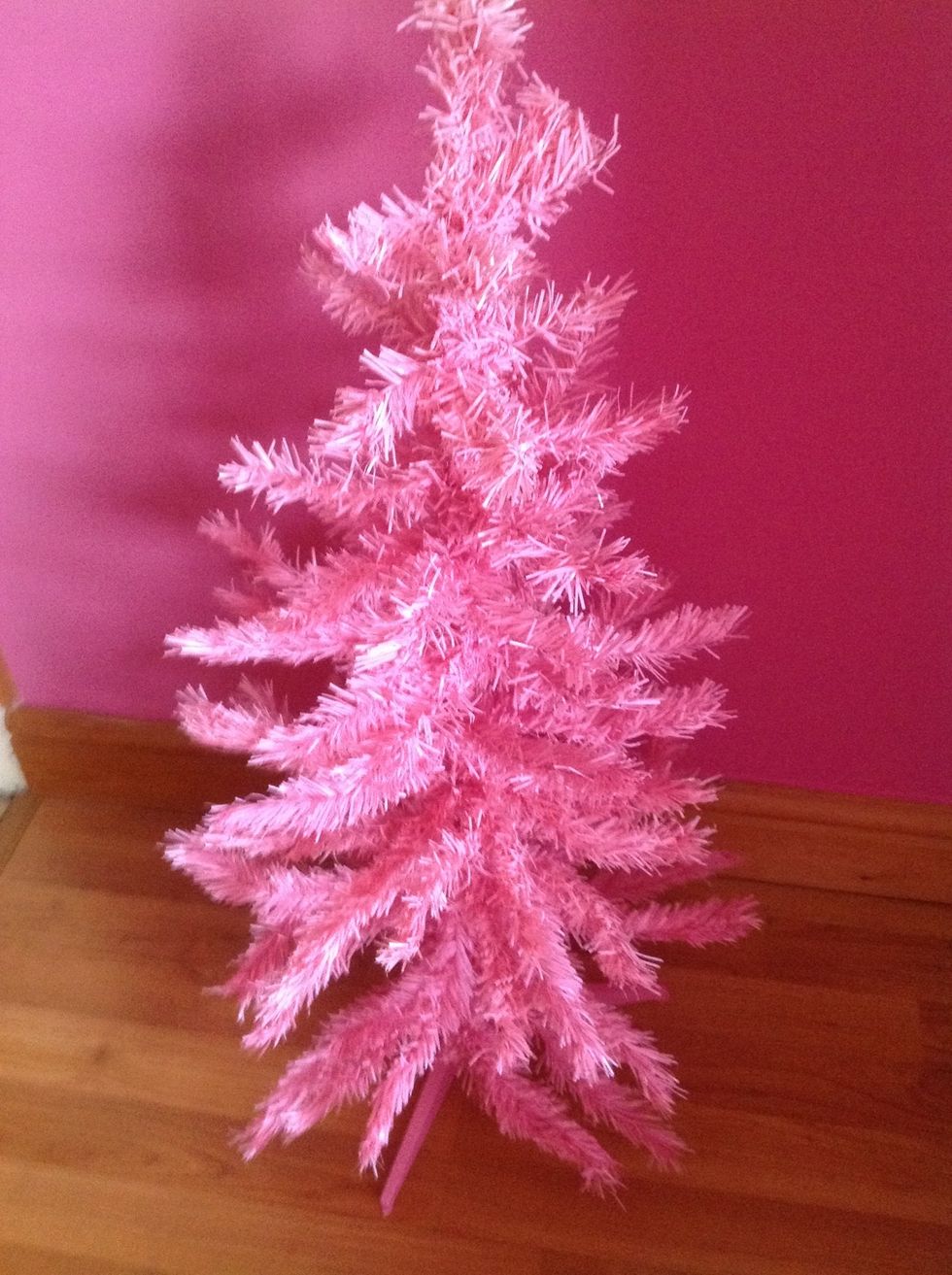 Get your Christmas tree and spread the branches out or do whatever to make the branches spread out!