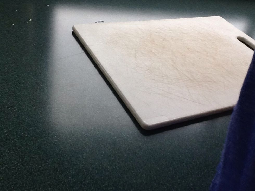 Get your cutting board out make sure to put a wet paper towel under it to keep it steady