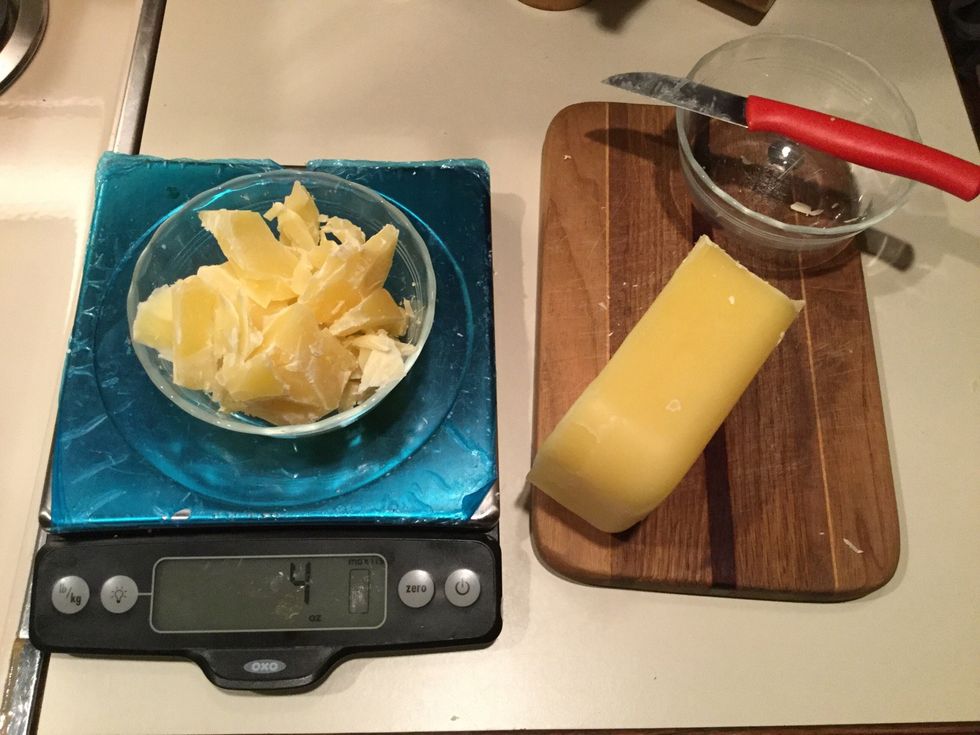 Get your desired measuring device, and set a  small bowl on it. Then set your measuring device to zero. After it is set, start cutting the beeswax and put it in the bowl until you have 4 ounces.