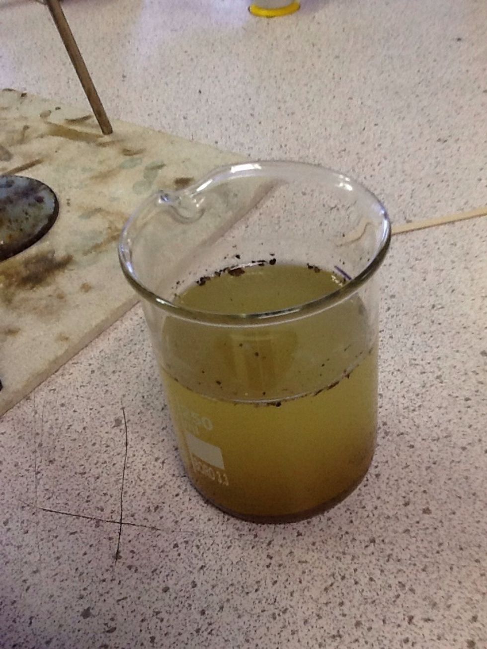 Get your dirty water... And get some paper and place it into a flask...