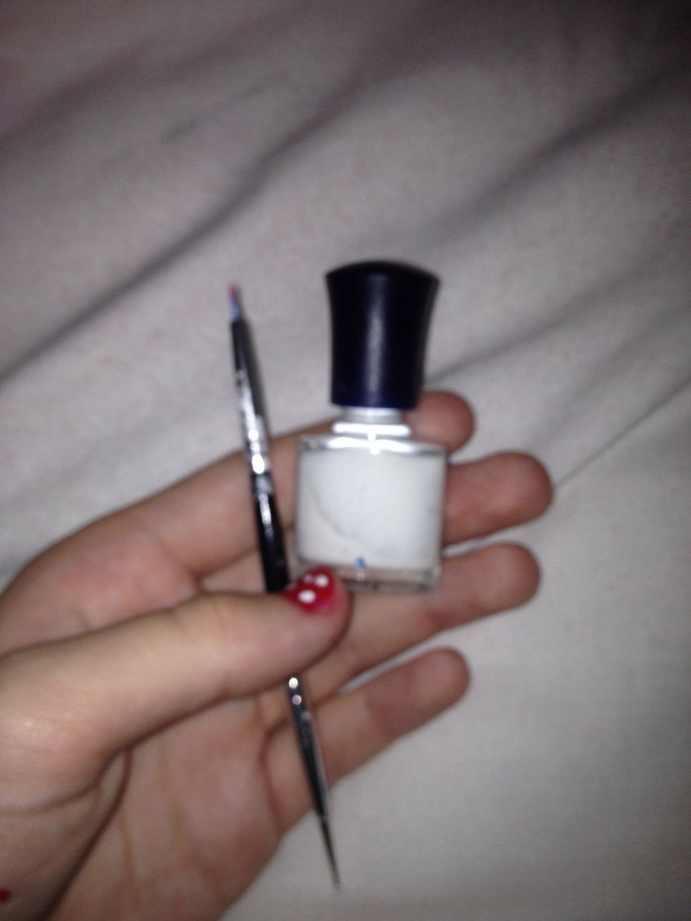 Get your dotting tool and you white nail polish again!