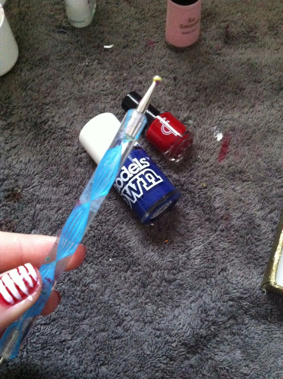 Get your dotting tool or the end of a bobby pin