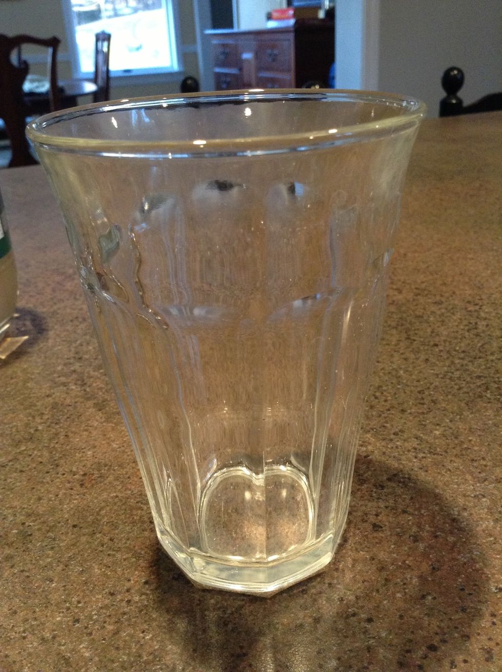 Get your glass ready. You can fill it with ice if you want, but I prefer it without.