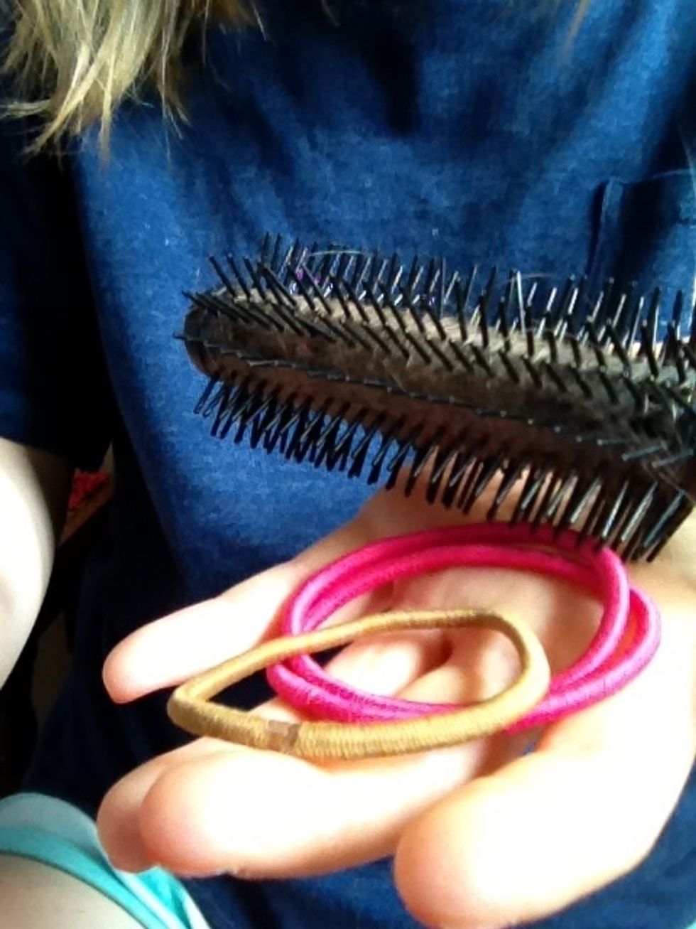 Get your hair band(s) and hair brush.