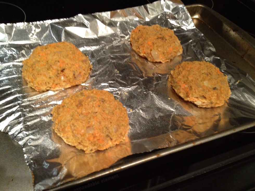 Get your hands dirty and form the mixture into 4-6 patties (depending on how big you like em). Brush the top of each one with a little olive oil.