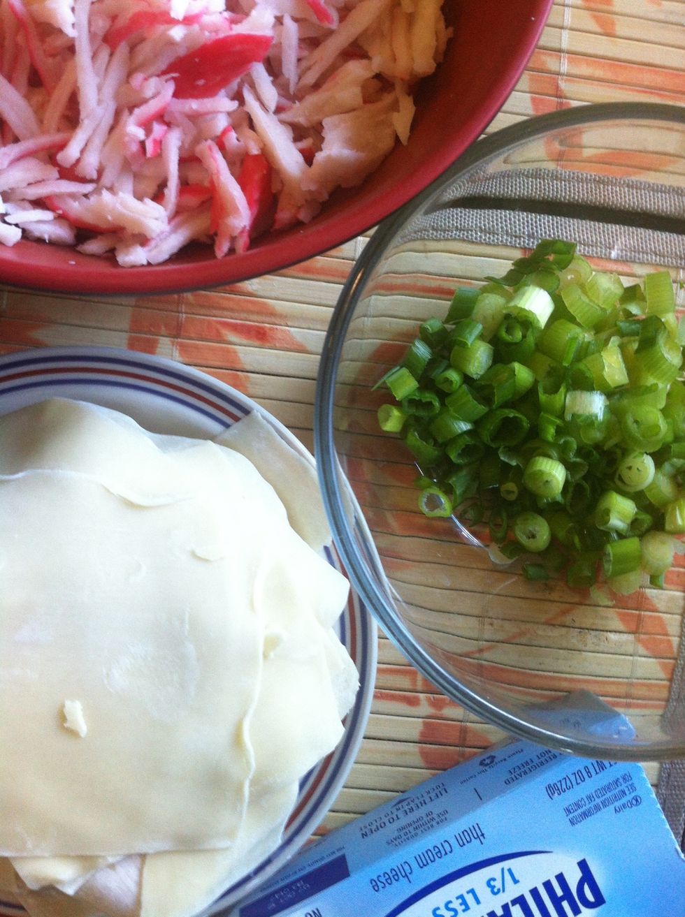 get your ingredients ready! \ud83d\ude03 chop up your scallions, & make sure your cream cheese is at room temp. shred up the imitation crab into tiny pieces as well.