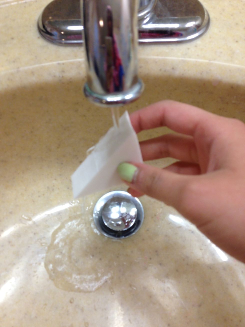 Get your makeup sponge slightly wet (This helps the polish sit better)