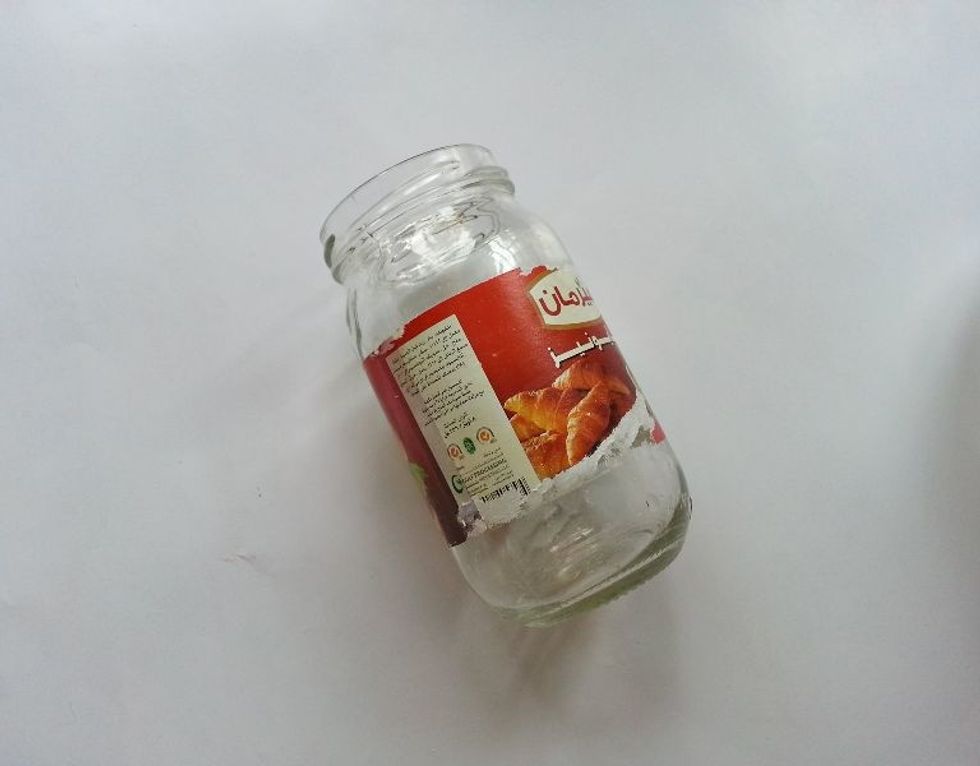 Get your materials ready. You need a clean glass jar or bottle. Don\u2019t worry if you\u2019re unable to get rid of the jar or bottle label; we\u2019ll cover them anyways.
