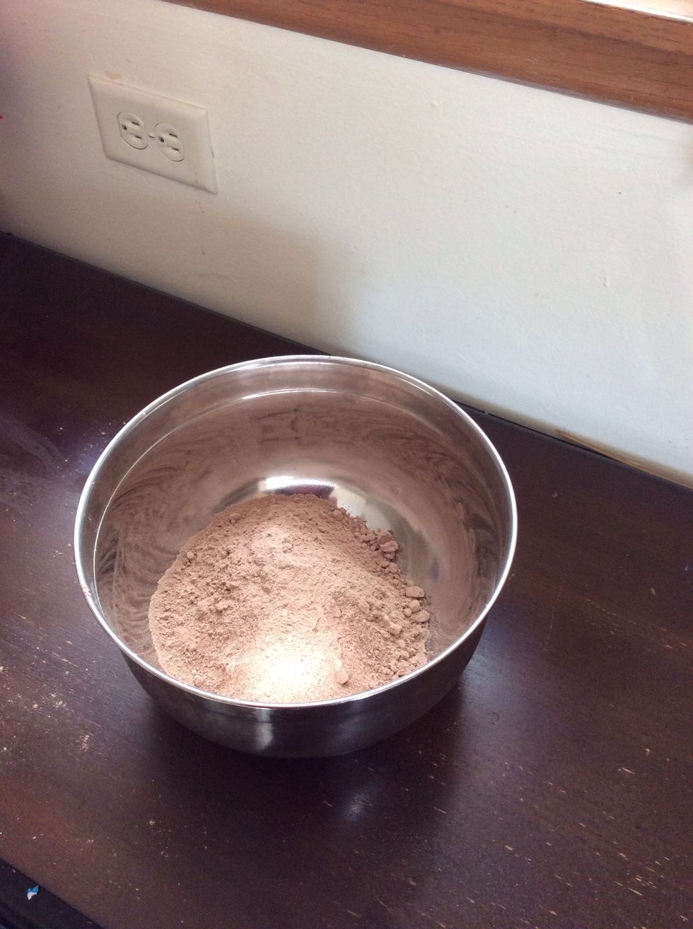 Get your mixing bowl and pour your cake mix in to it.